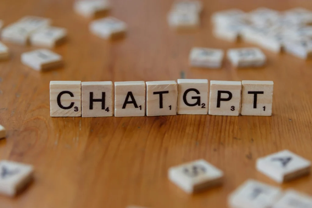 Scrabble tiles spelling 'CHATGPT'